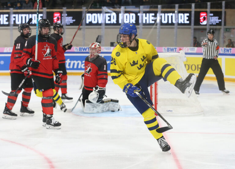 Sweden Smashes Canada in Opener